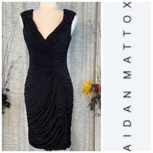 Aidan Mattox black sleeveless body-con party dress.